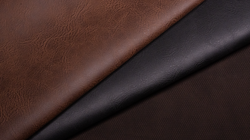Free Detailed close-up of brown and black leather textures, perfect for fashion and design projects. Stock Photo