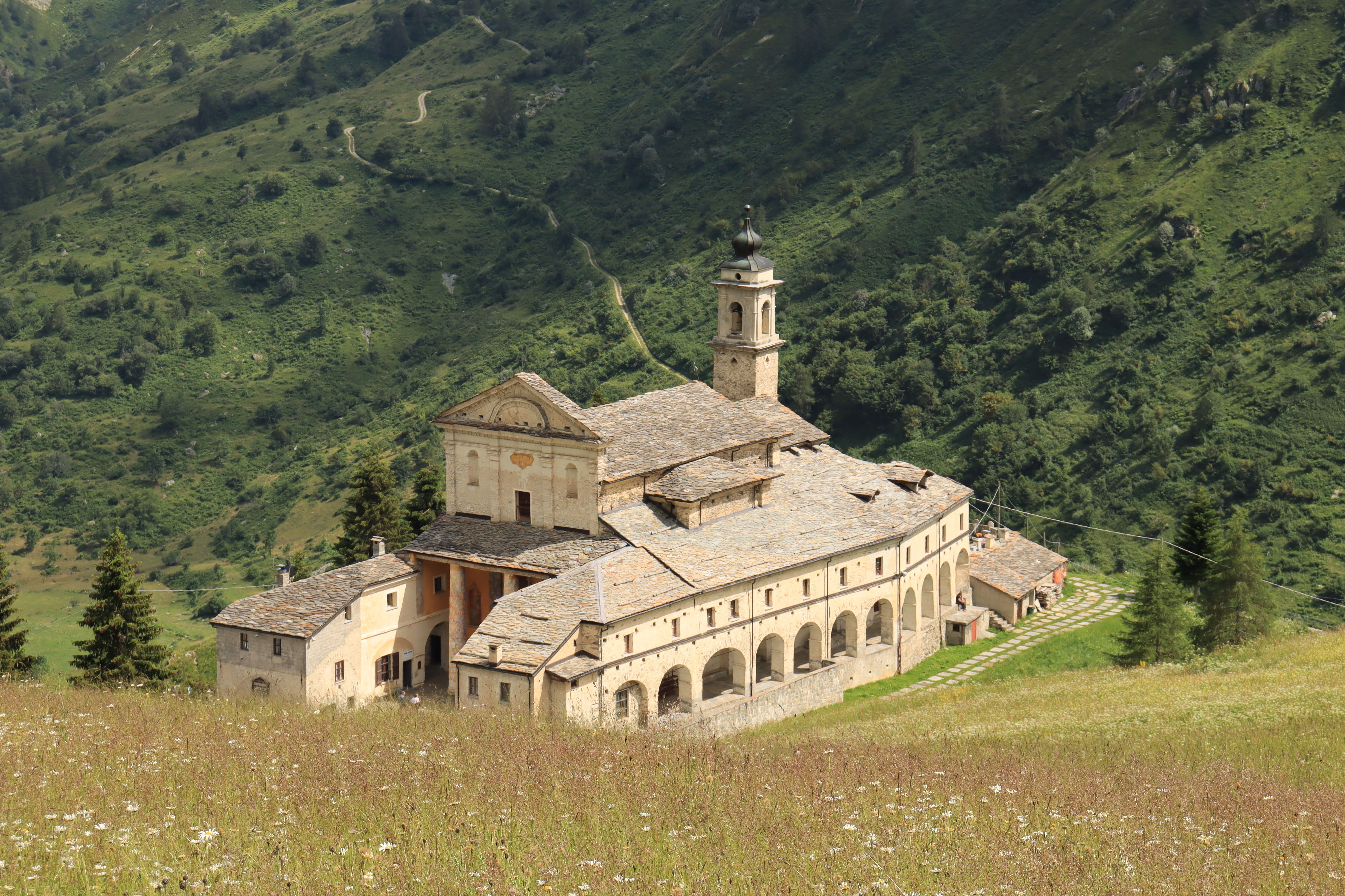 Explore a picturesque monastery set in Piemonte's verdant hills, offering tranquility and history.