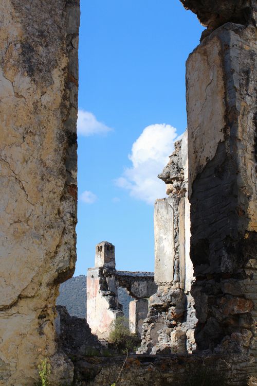 Ancient Stone Ruins Framed by Weathered Walls · Free Stock Photo