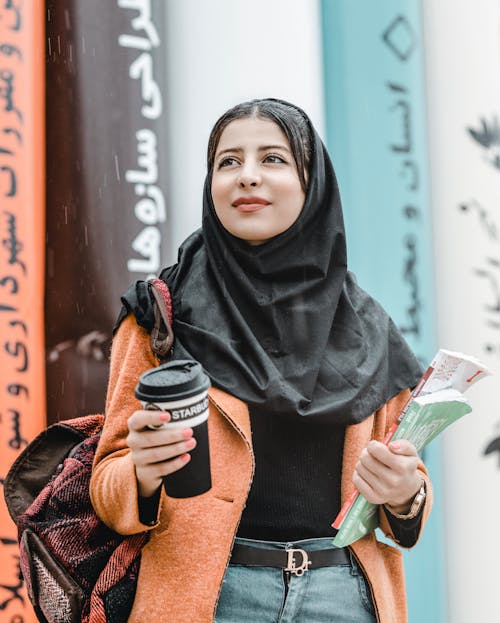 Shallow Focus Photo of Woman Wearing Black Hijab