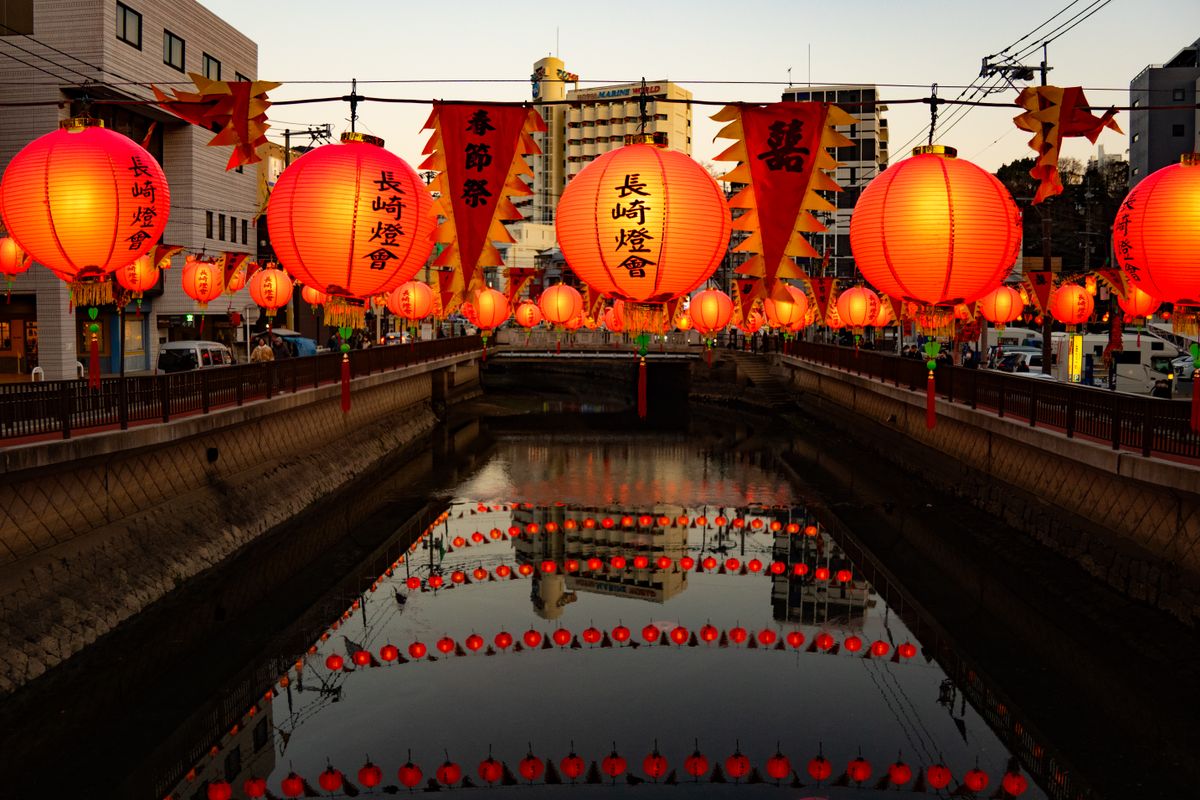Nagasaki Lantern Festival — lanterns reflected in a canal during the Chinese New Year celebration
