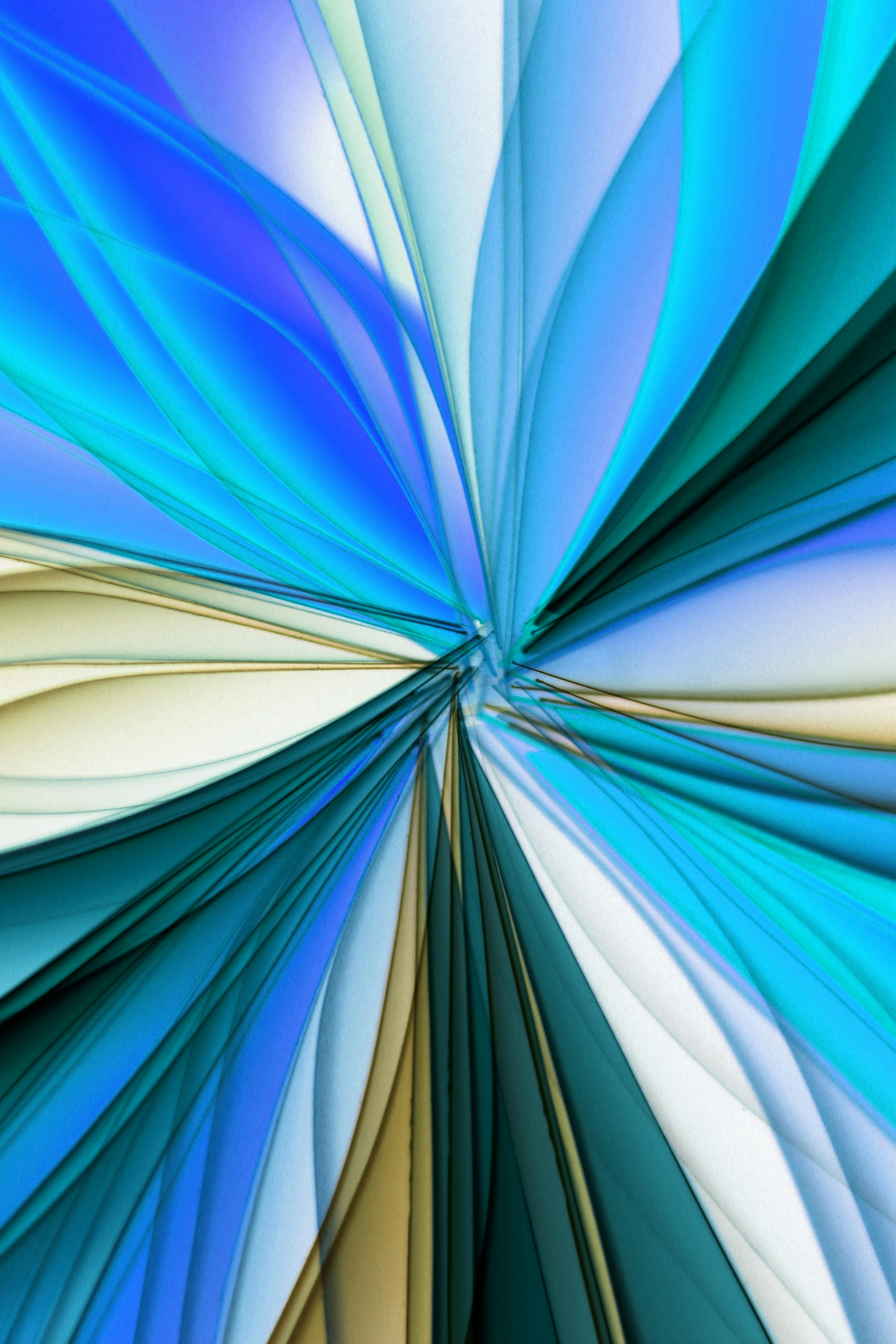 Colorful abstract design with blue and green patterns creating a dynamic, flowing artistic effect.