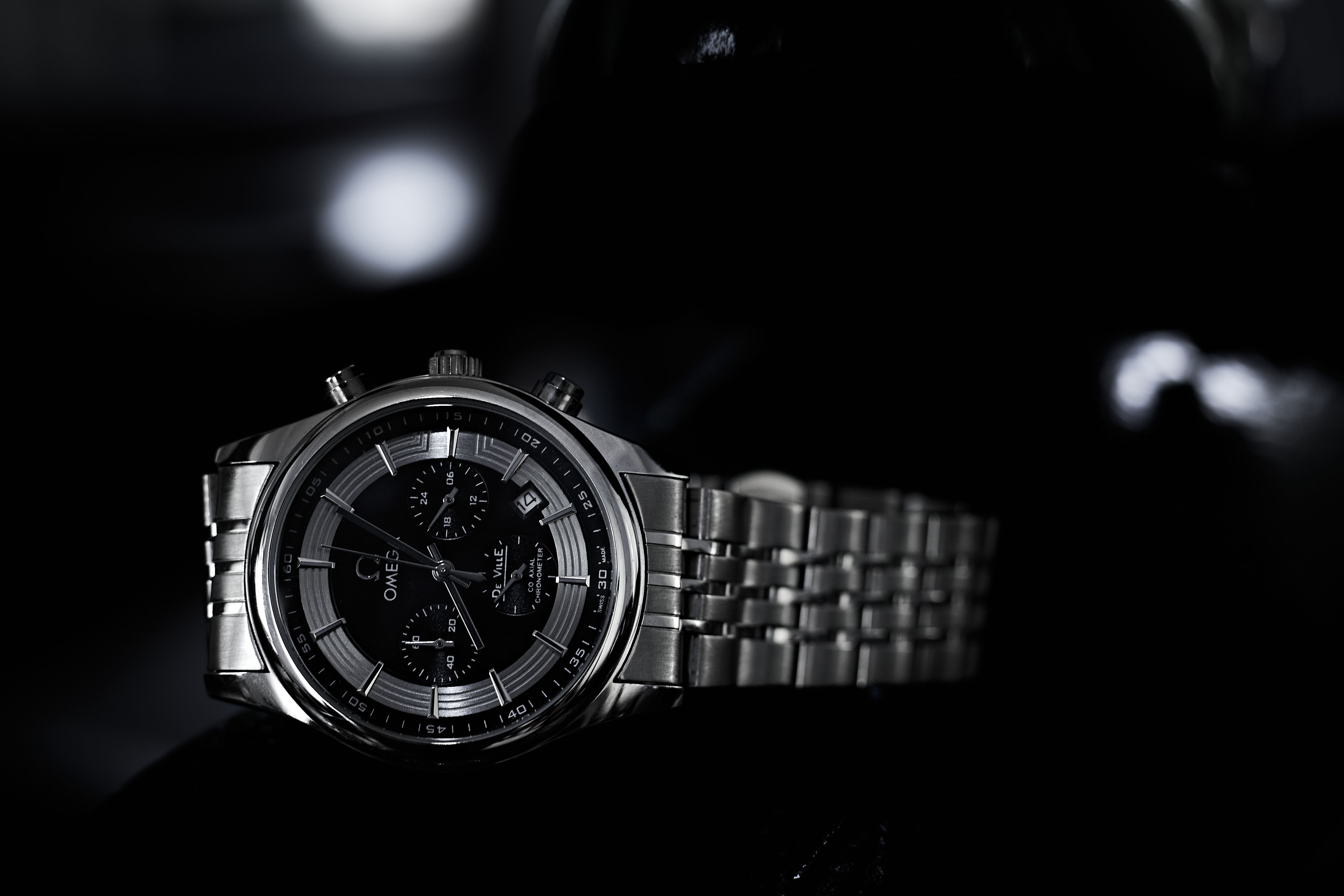 Stylish luxury watch with a stainless steel bracelet and chronograph features. Perfect for elegance and precision.