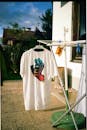 White T-shirt on Clothes Rack