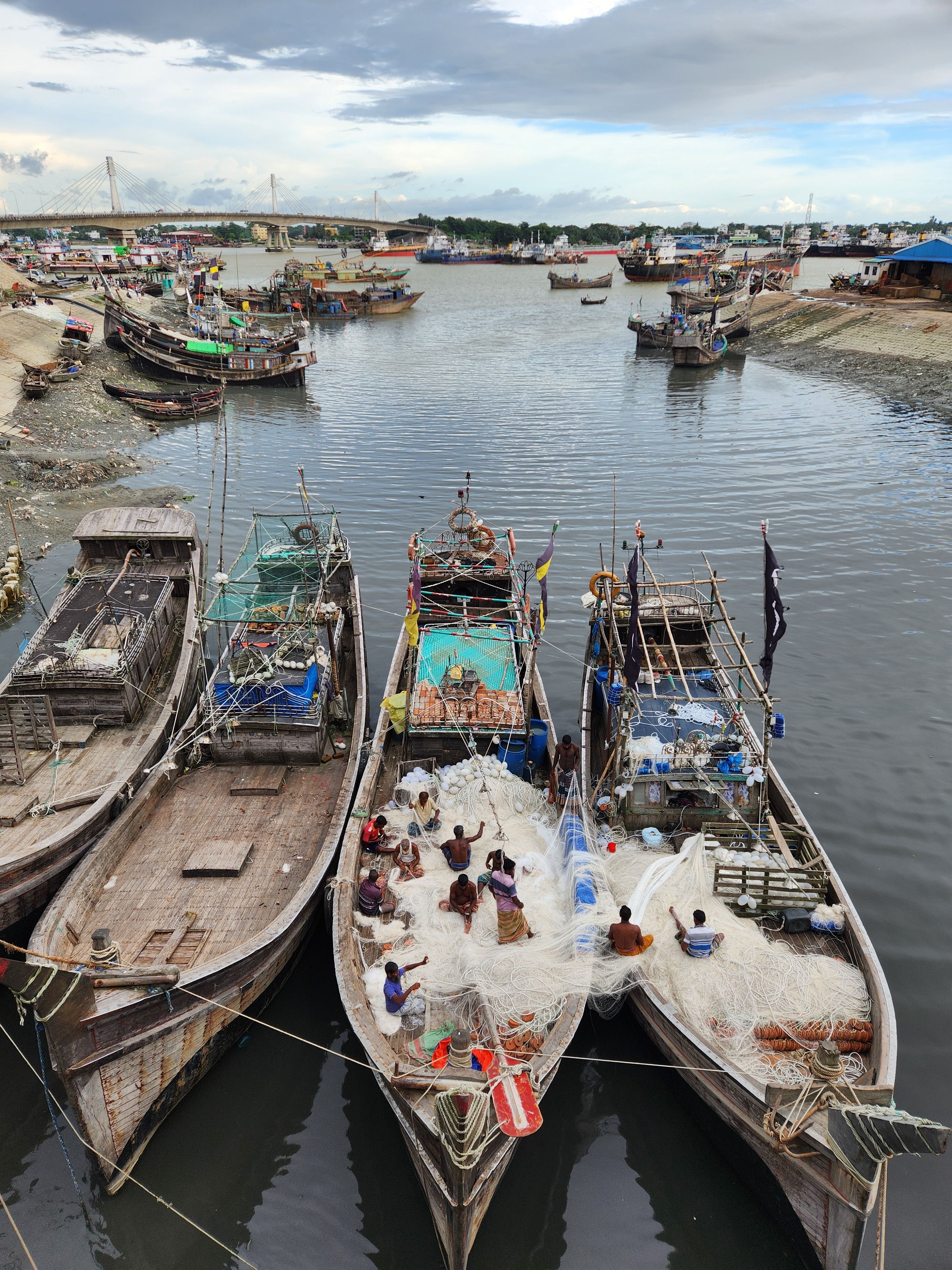 Fishing Boats Docked at a Scenic Harbor · Free Stock Photo