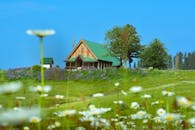 Scenic countryside church in vibrant meadow