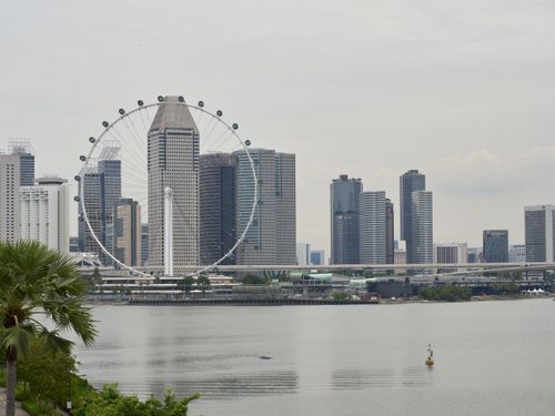 Free A scenic view of Singapore's skyline featuring the Singapore Flyer and modern architecture. Stock Photo