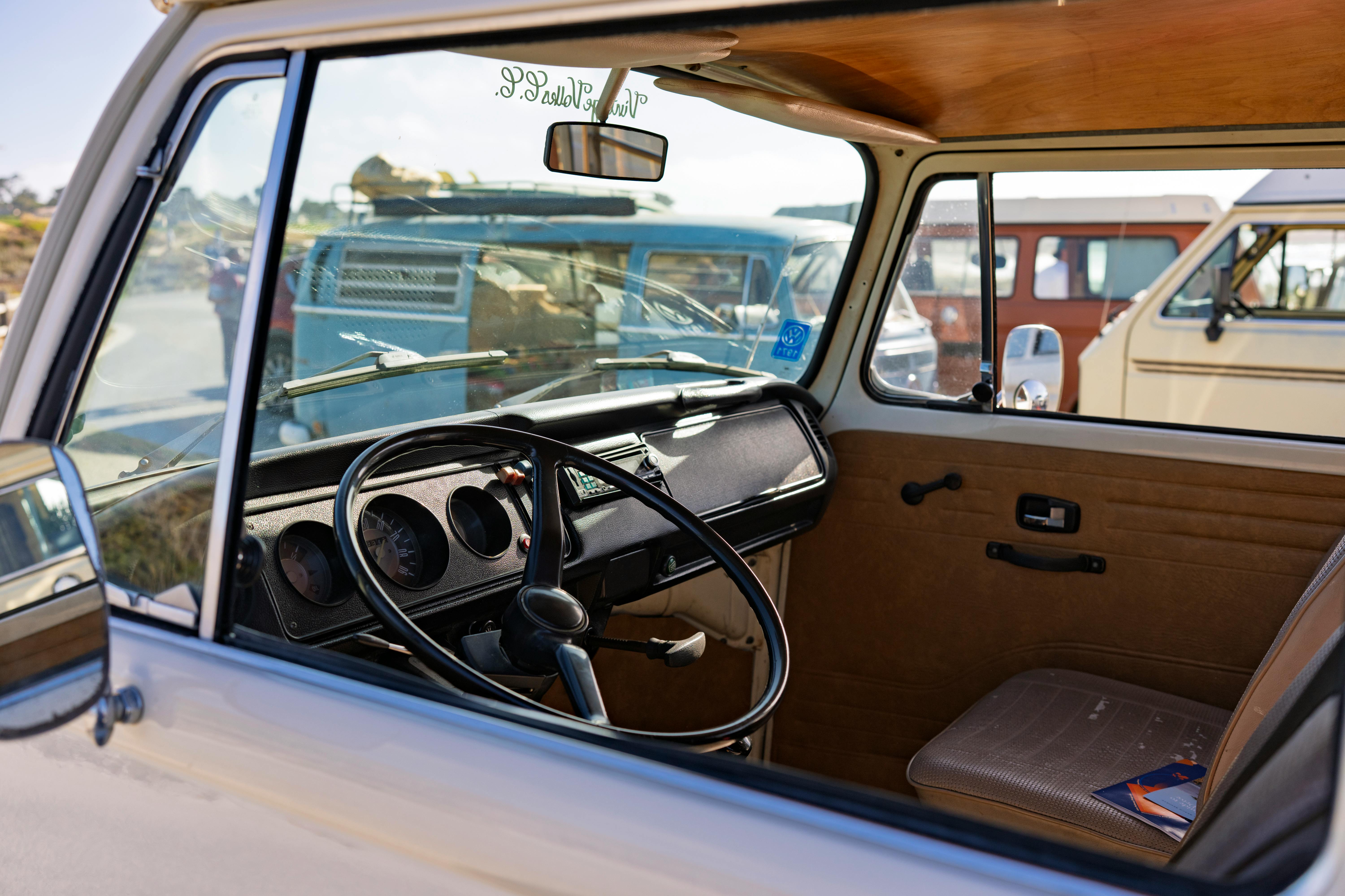 Interior view of a classic Volkswagen van parked outdoors in Monterey, California.