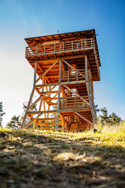 Free Wooden observation tower in Lipany, Slovakia, under bright blue sky. Stock Photo