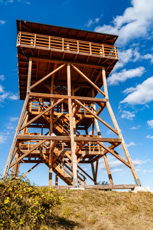 Free Explore the wooden observation tower in Lipany, Slovakia, set against a clear blue sky, perfect for adventure seekers. Stock Photo