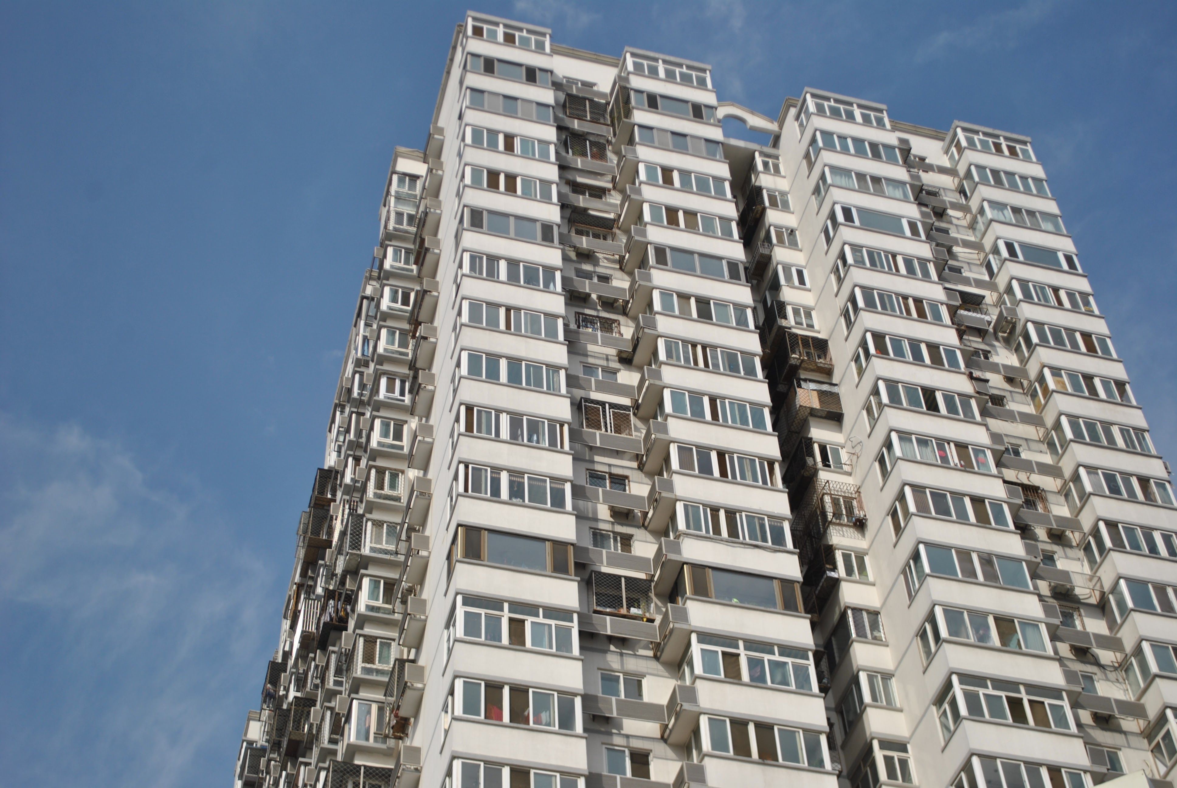 Curated visual reference: High Rise Apartment Building Against Blue Sky Photo Inspiration