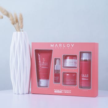 Chic Marlov skincare gift set beside elegant white vase for skincare enthusiasts.
