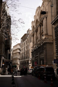 View of a historic European street with classic architecture during daytime.
