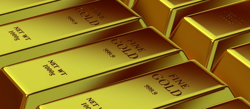 金の国際価格が史上初めて4,600ドルを突破したニュースに合わせ、輝く金の延べ棒を積み重ねたイメージ
