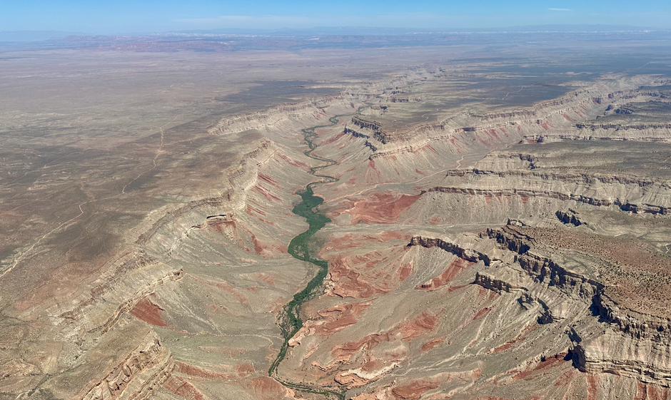 Ultimate Grand Canyon Tour by Helicopter Review: Soaring Over America's Most Iconic Natural Wonder Review 2026 - Stunning aerial shot of the meandering canyon near Lake Powell, Arizona.