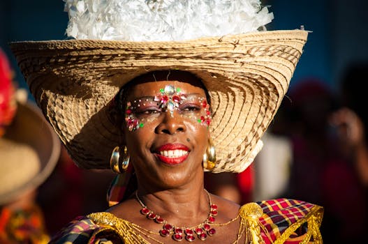 Lively portrait of a woman in festive carnival attire with a decorative hat, makeup, and jewelry.