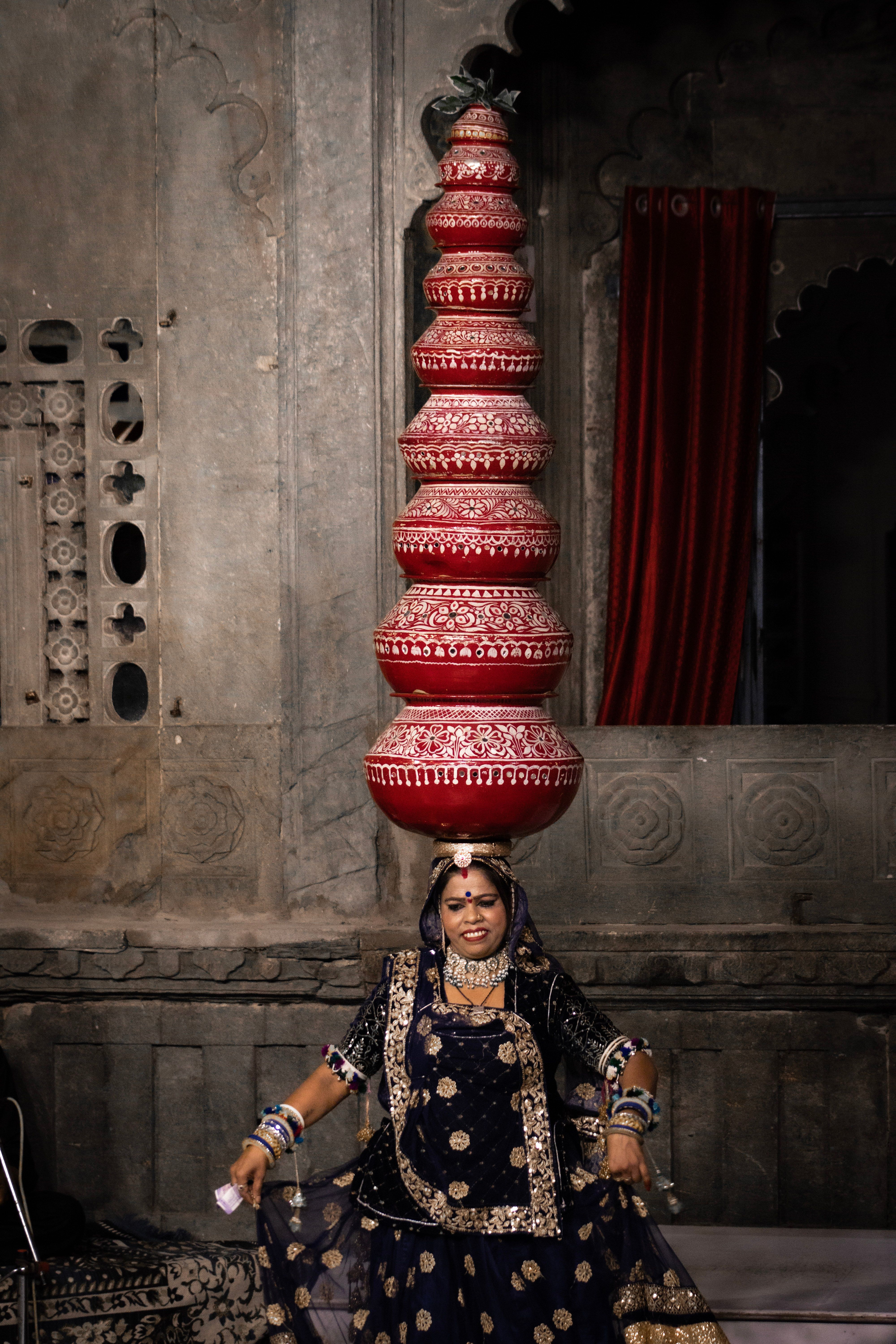 Rajasthani Bhawai folk dance balancing pots at Jaisalmer desert camp