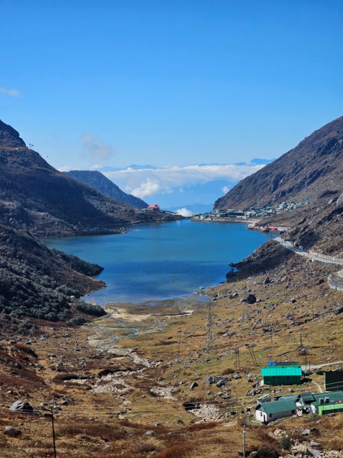 Free Tranquil lake nestled between mountains in Sikkim, India, showcasing serene natural beauty. Stock Photo