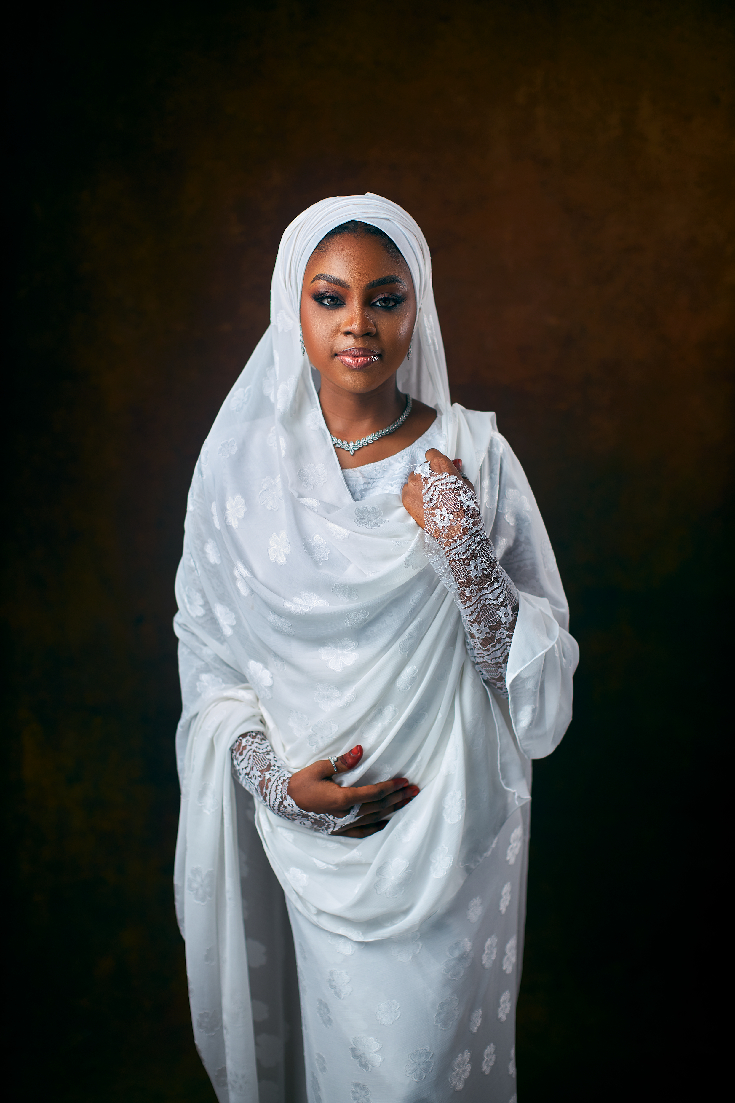 Elegant Woman in Traditional Pink Hijab Portrait · Free Stock Photo