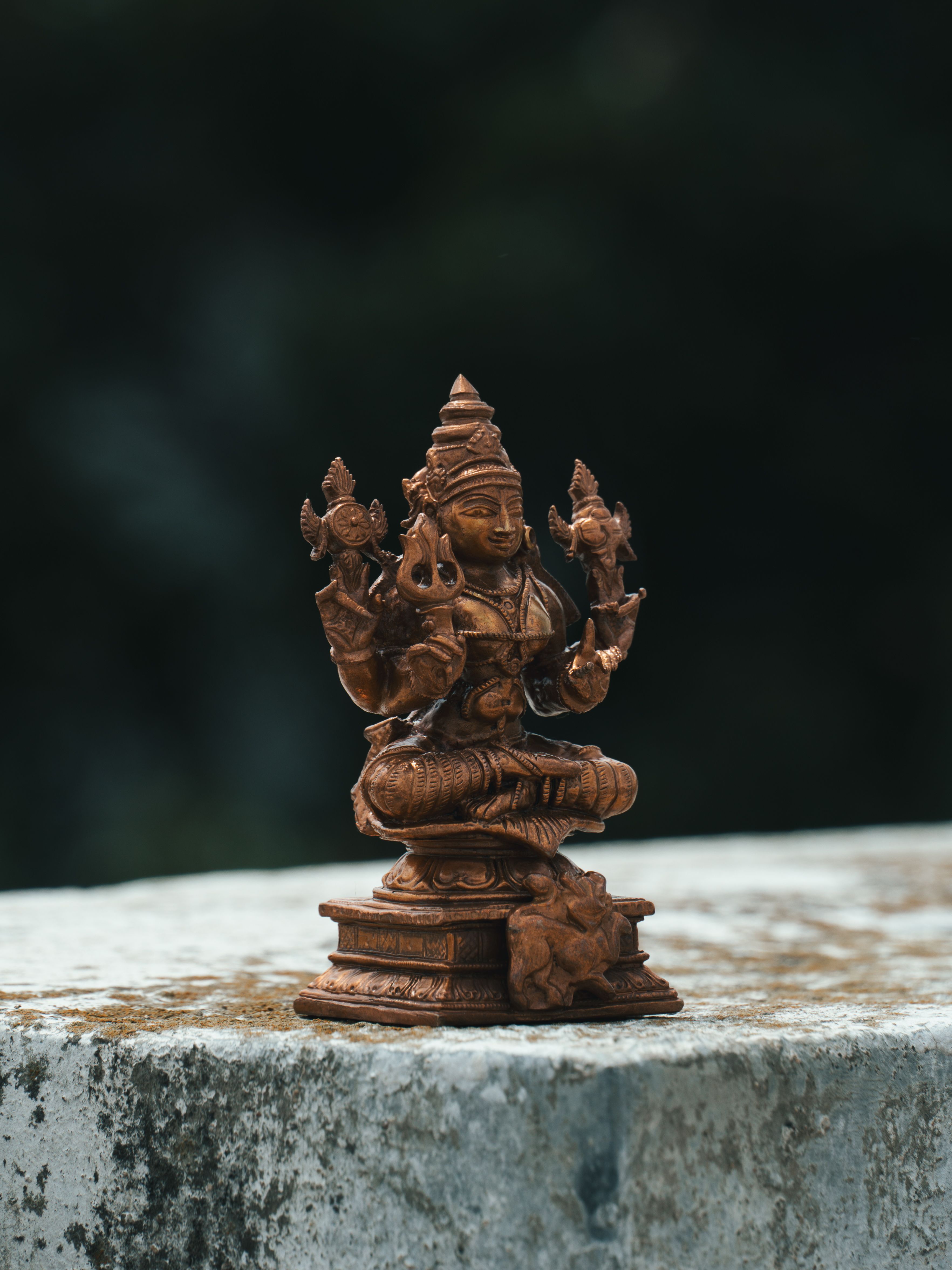 A finely detailed Hindu deity sculpture made of bronze, showcasing artisan craftsmanship in Bengaluru, India.