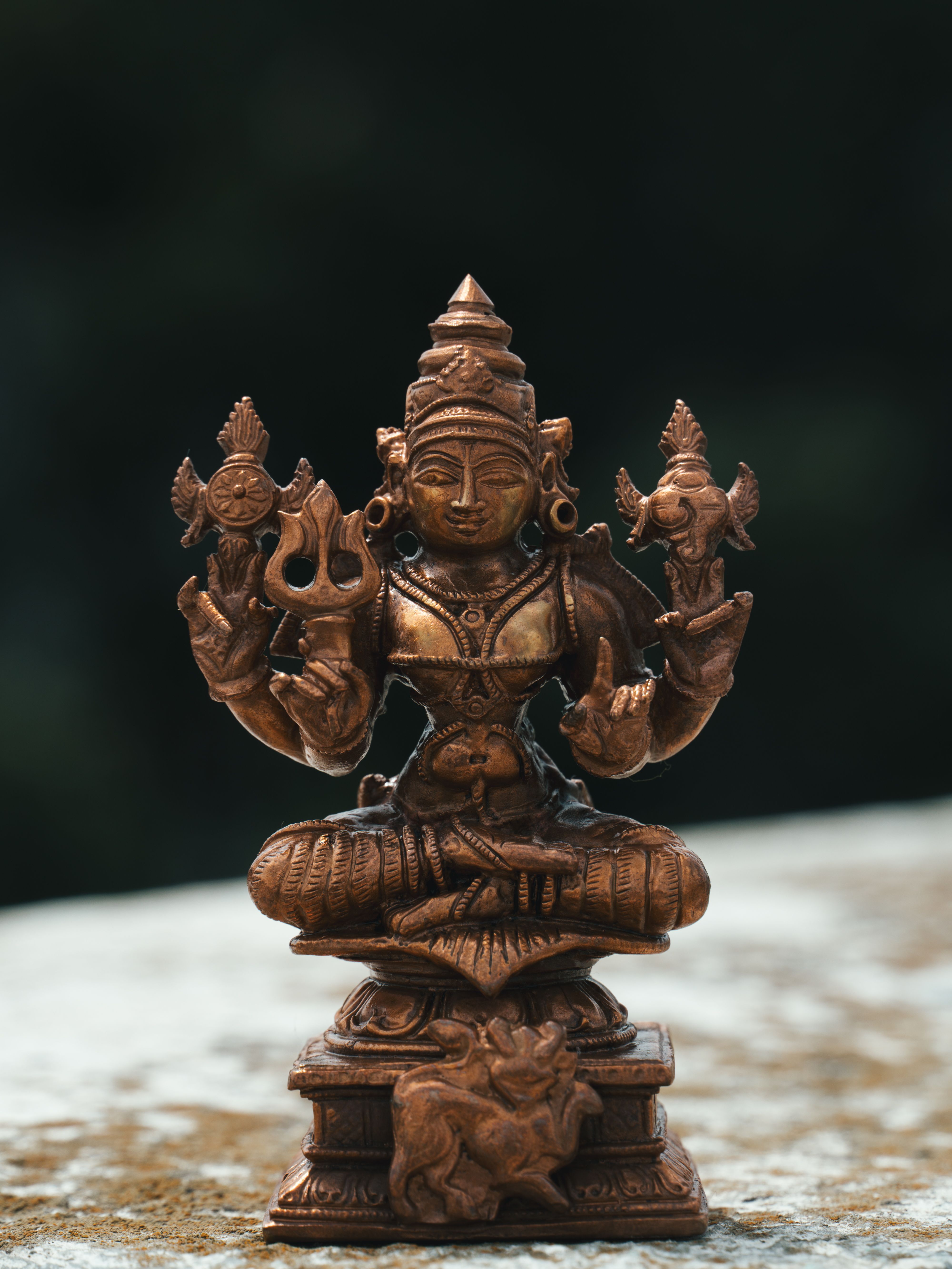 Detailed bronze statue of a Hindu deity showcasing intricate artisan craftsmanship in Bengaluru, India.