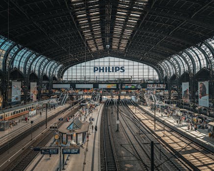 Vibrant interior view of Hamburg Central Station showcasing architectural beauty and bustling activity.