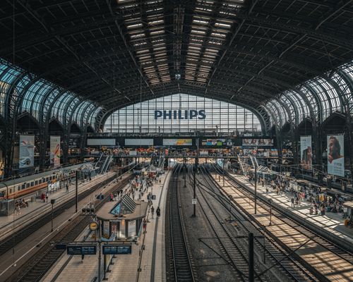 Free Vibrant interior view of Hamburg Central Station showcasing architectural beauty and bustling activity. Stock Photo