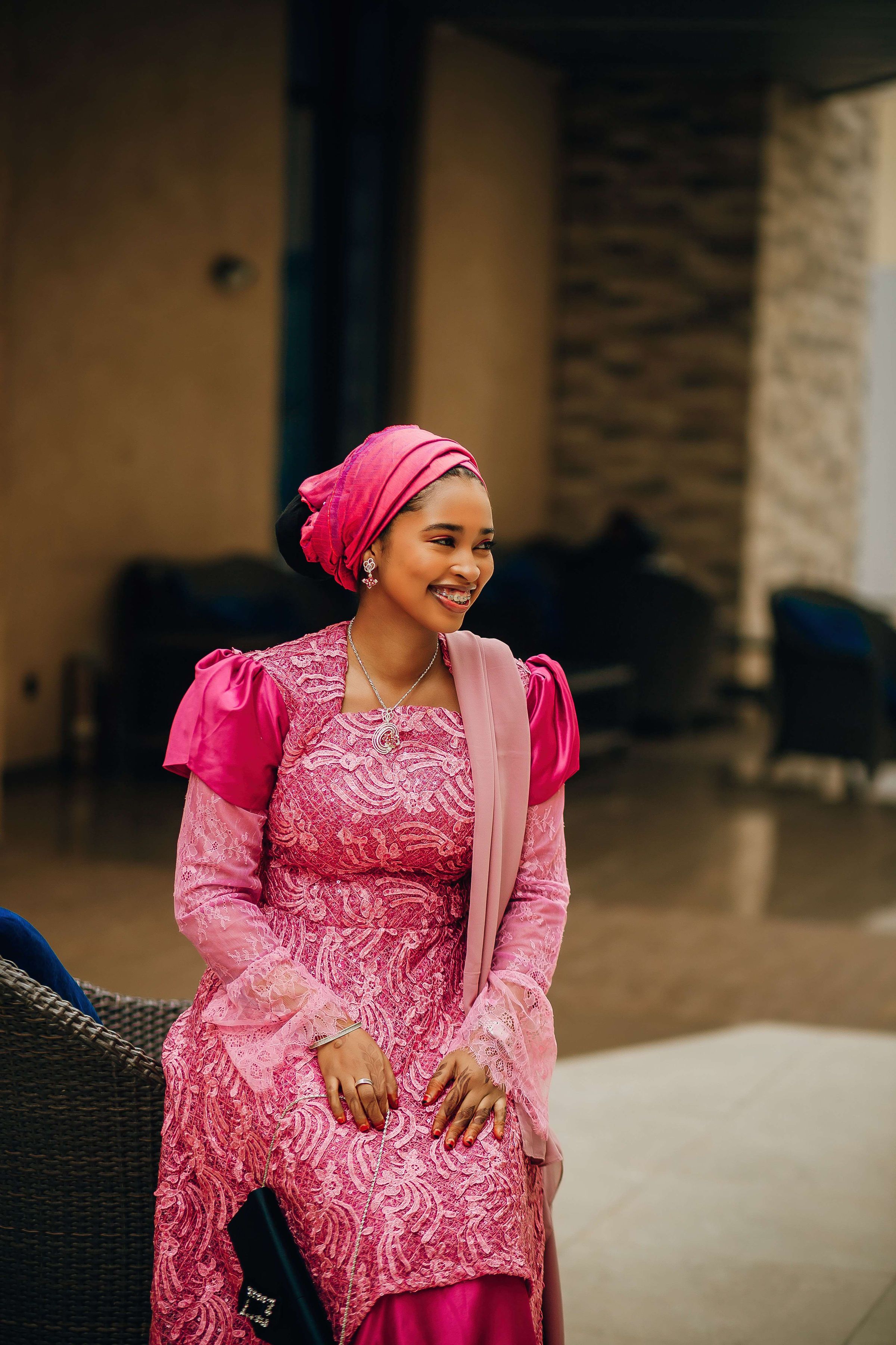 Elegant Woman in Pink Traditional Dress Indoors · Free Stock Photo