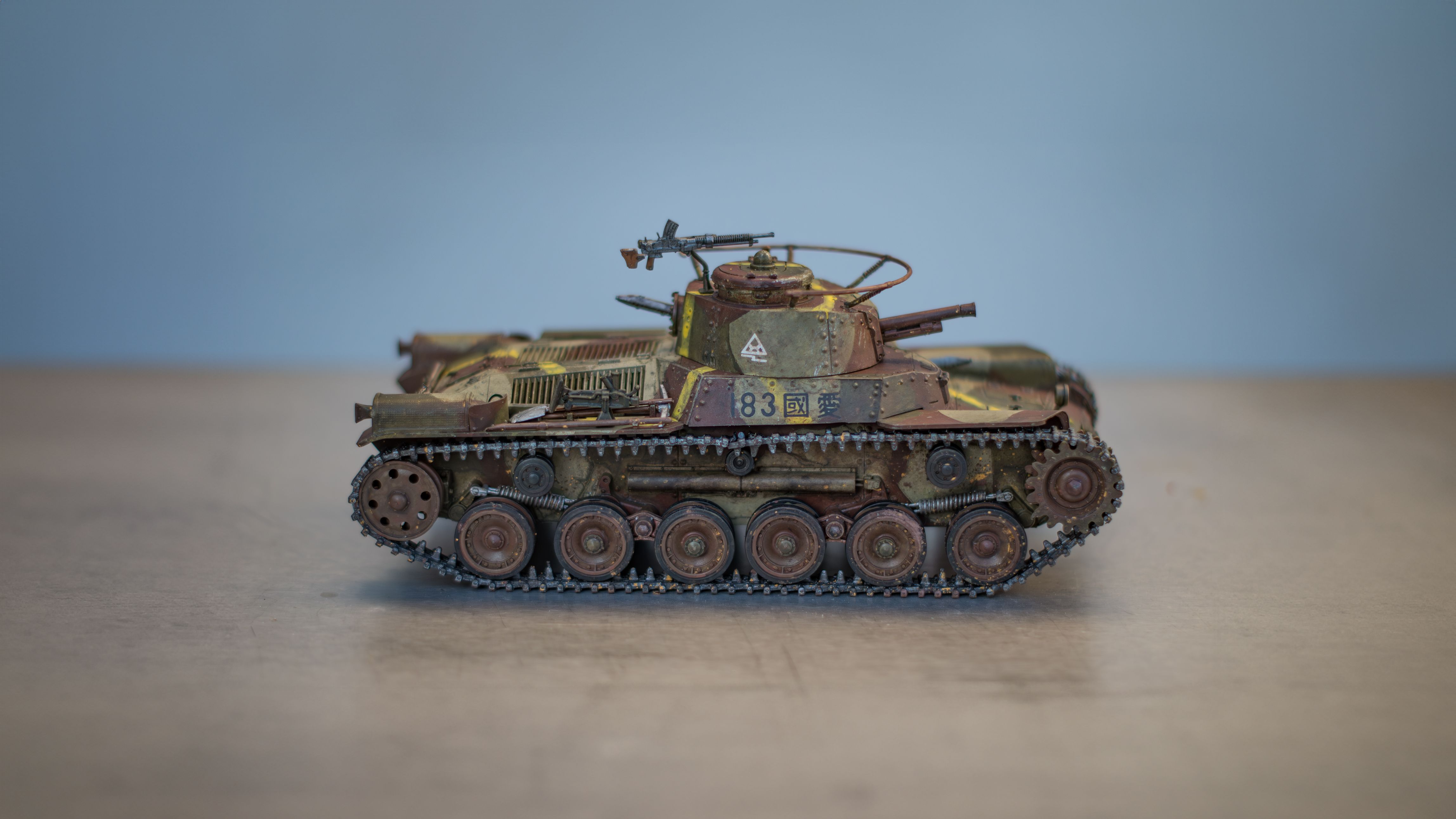Scale Model Tank on Display Surface · Free Stock Photo