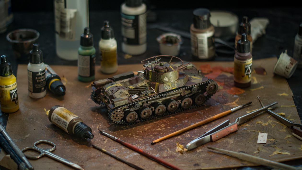 Model Tank Scene Detailed Model Tank Build with Painting Tools · Free Stock Photo