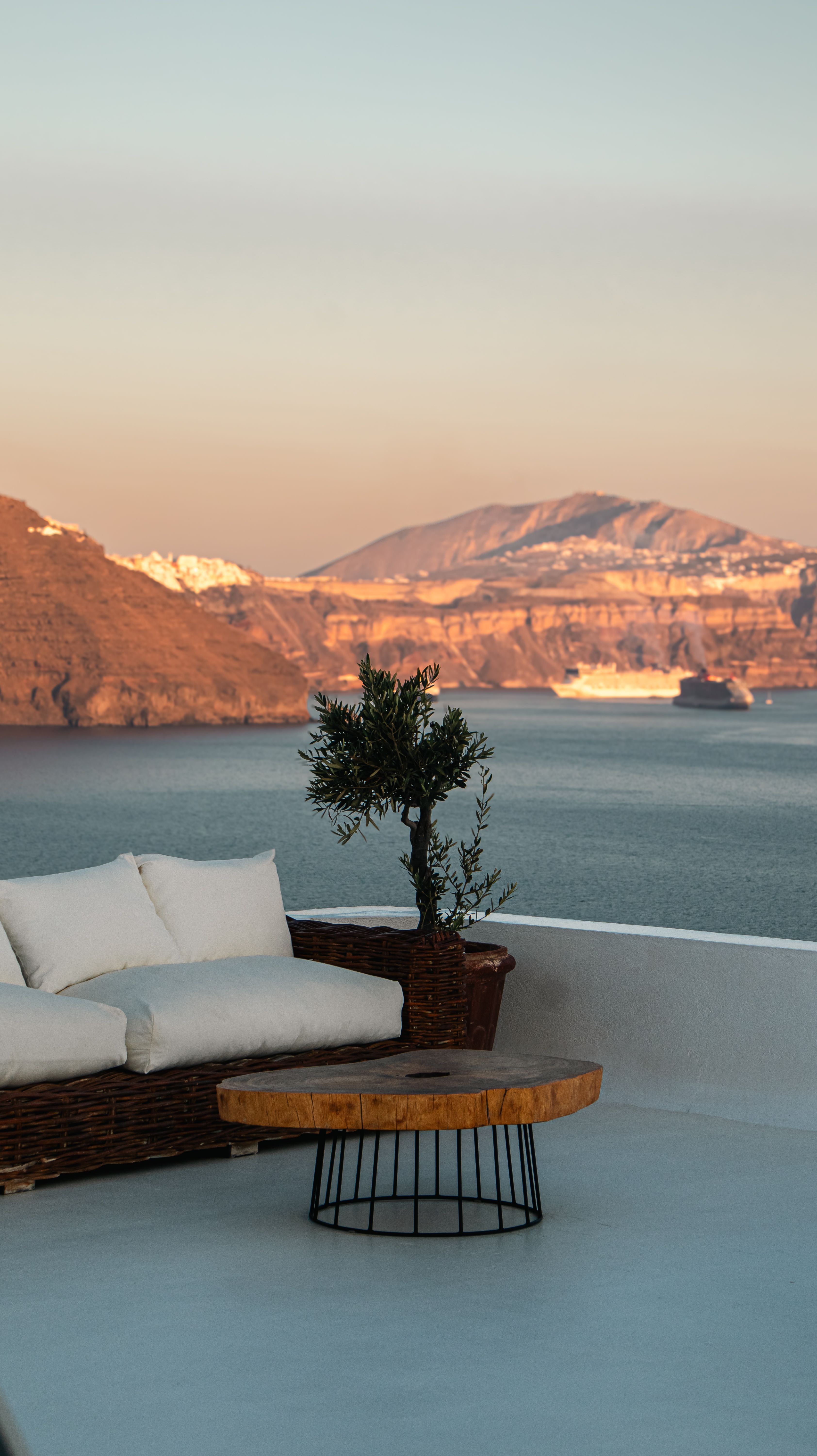 Luxury Santorini terrace sunset Greece travel