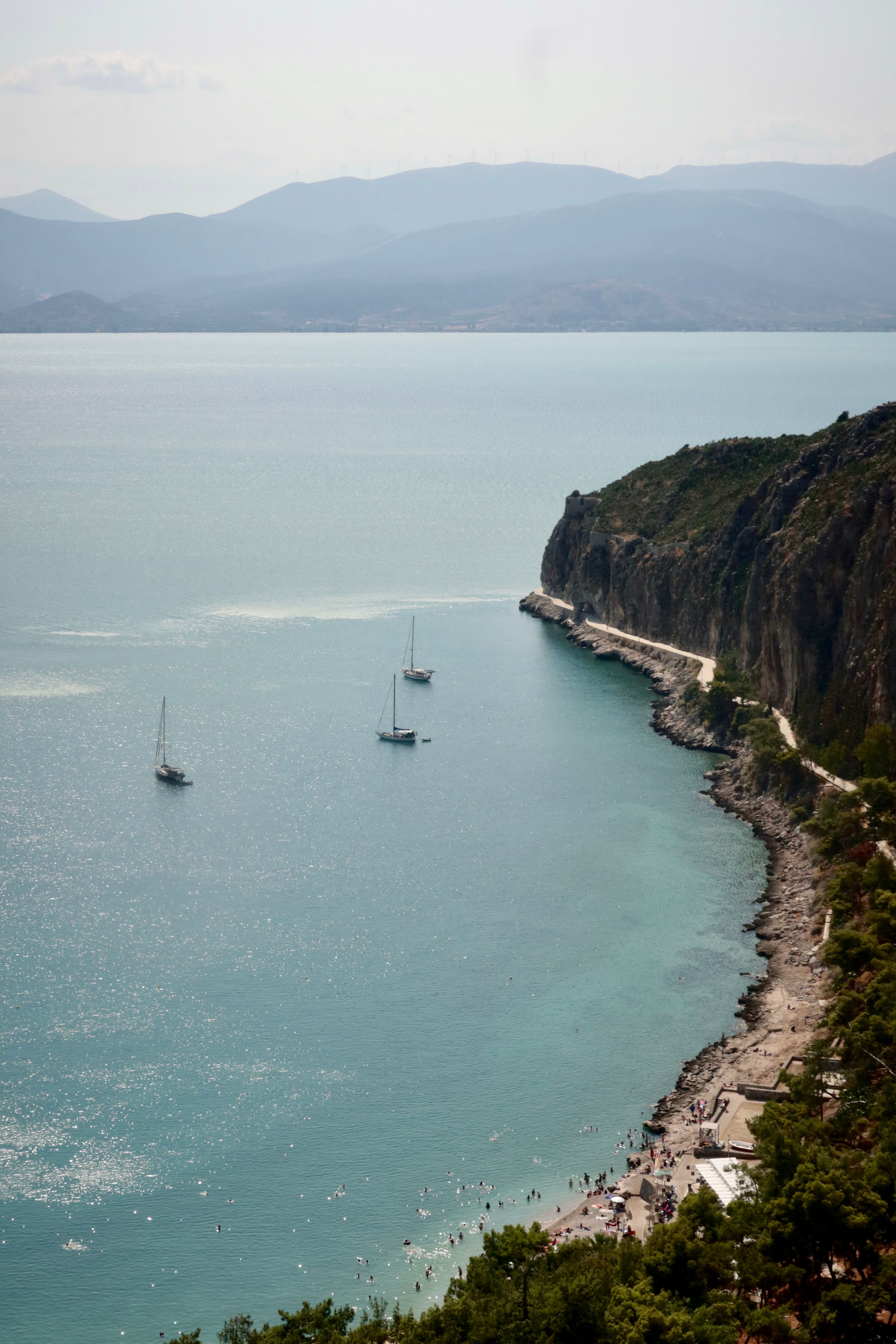 Coastal view of Nafplio in the Peloponnese, Greece, with old town buildings above the sea