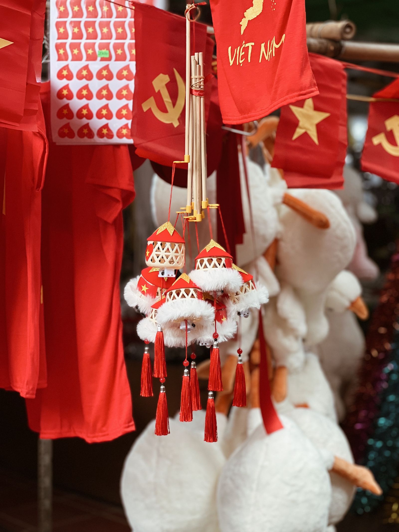 Vietnamese Lunar New Year Tet decorations market with red and gold ornaments