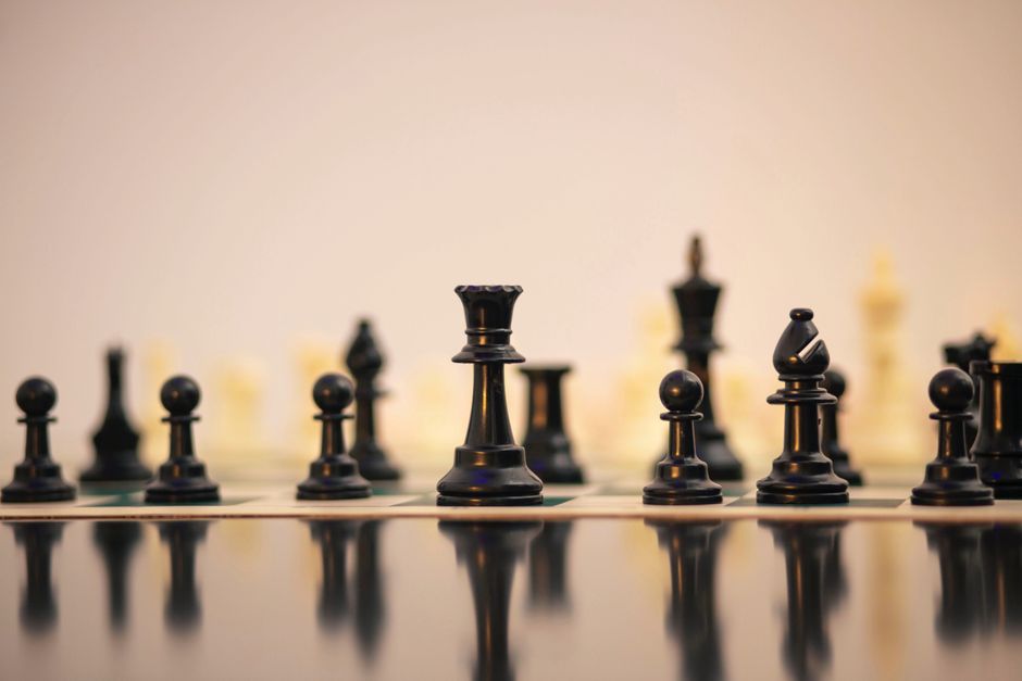Close-up view of chess pieces on a board in Kaduna, Nigeria.