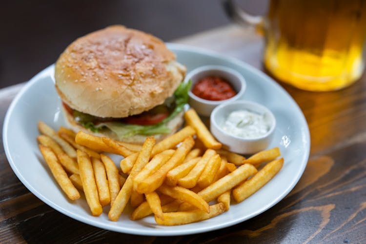 Burger And Potato Fries On Plate