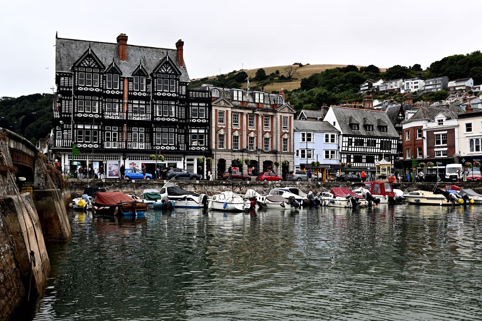 Boats and pastel historic buildings around Dartmouth harbour on the River Dart, Devon