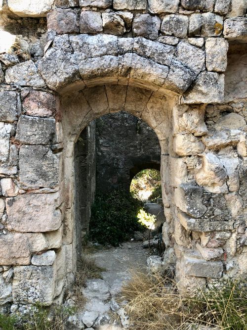 Free Explore the historic beauty of ancient stone ruins featuring detailed archways, perfect for travel and architecture enthusiasts. Stock Photo