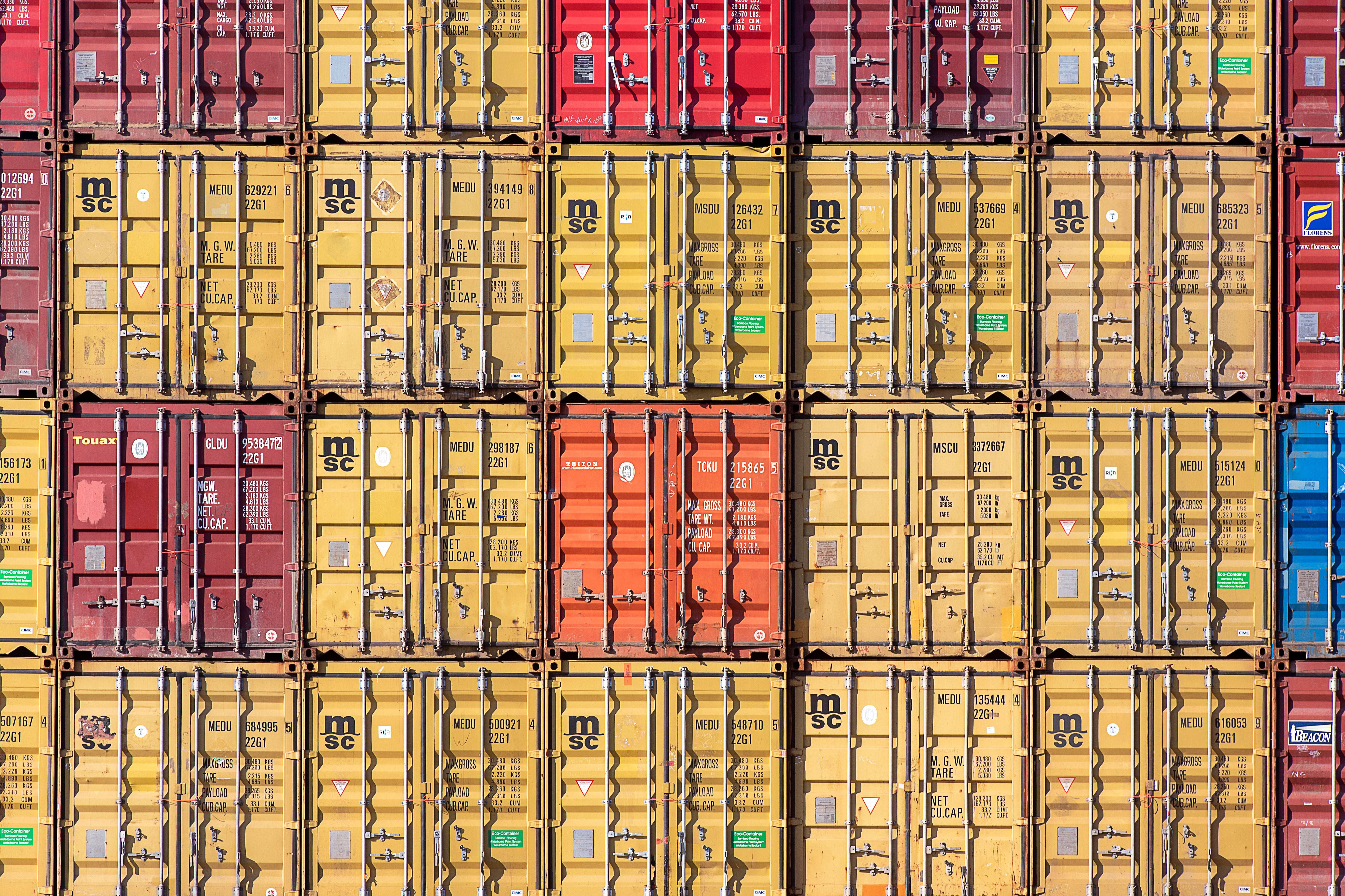 Colorful Stacked Shipping Containers Background