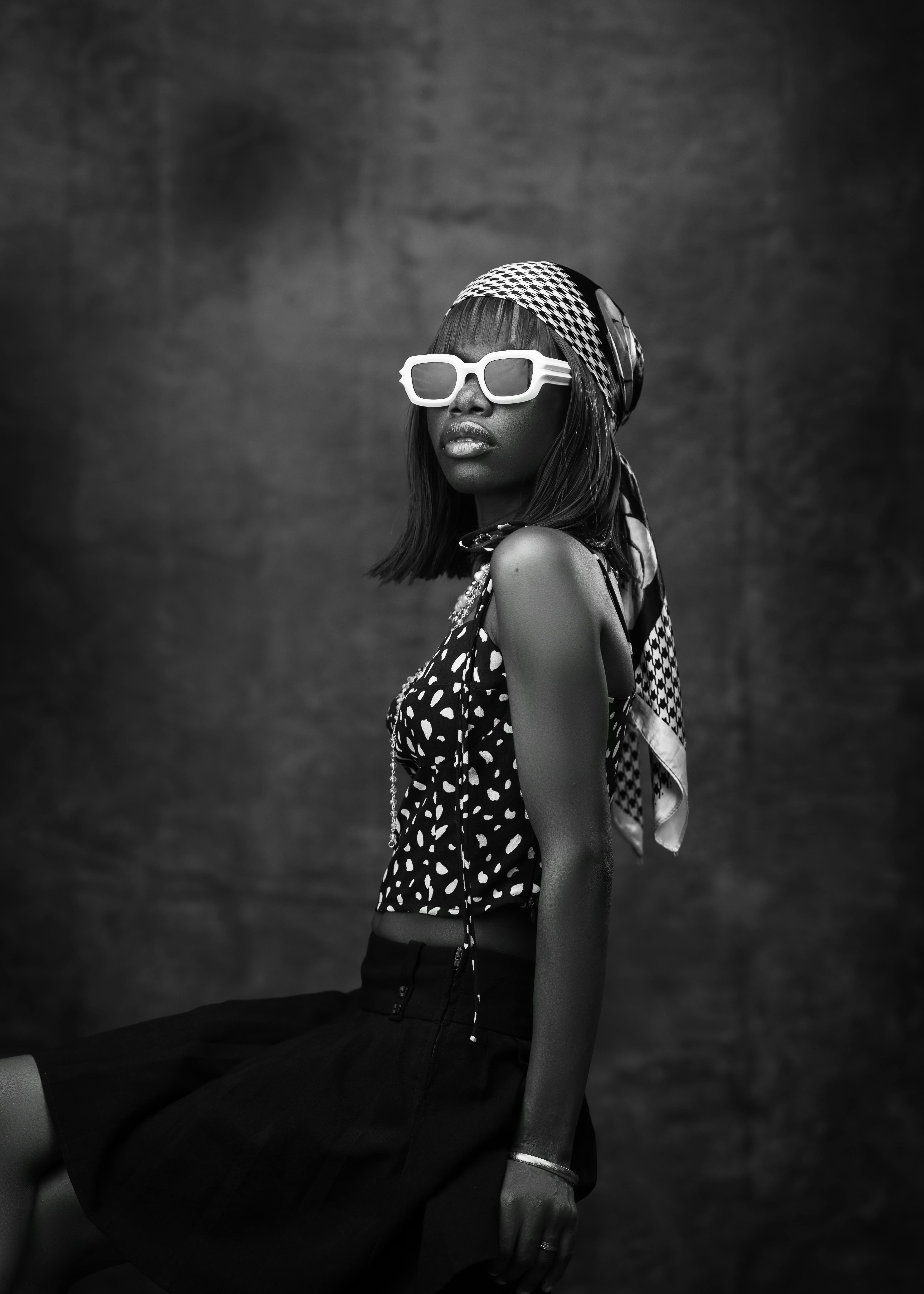 Free Elegant black and white portrait of a stylish woman in retro fashion. Stock Photo