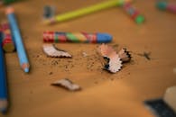Close-up of Colored Pencils and Shavings on Desk