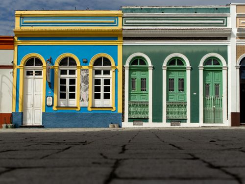 Free Colorful colonial buildings showcasing vibrant architecture in Manaus, Brazil. Stock Photo