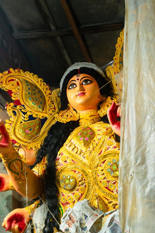 Free Exquisite clay idol of Goddess Durga being crafted for Durga Puja in Kolkata's Kumartuli. Stock Photo