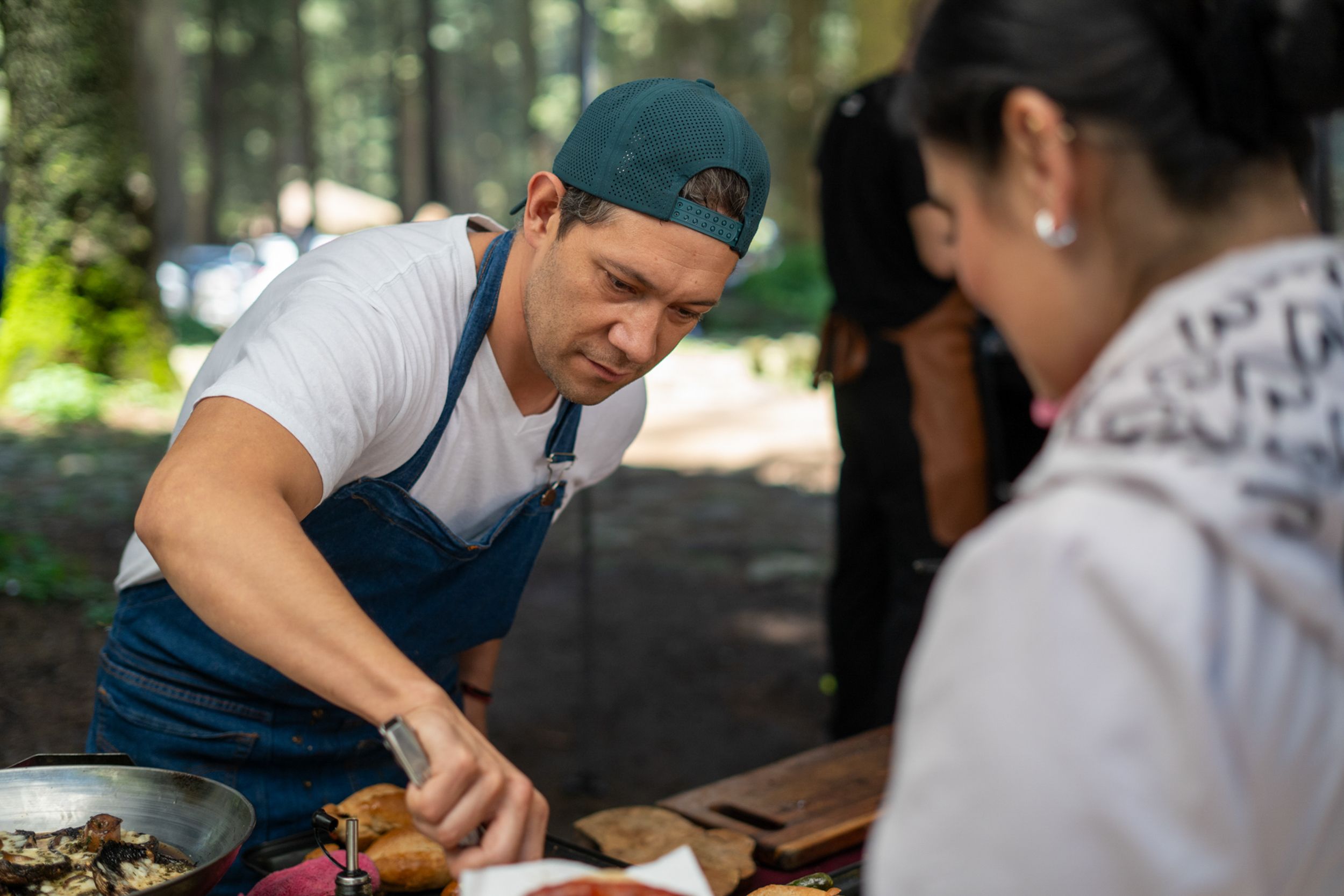 Chef Preparing Grilled Chicken Outdoors Event · Free Stock Photo