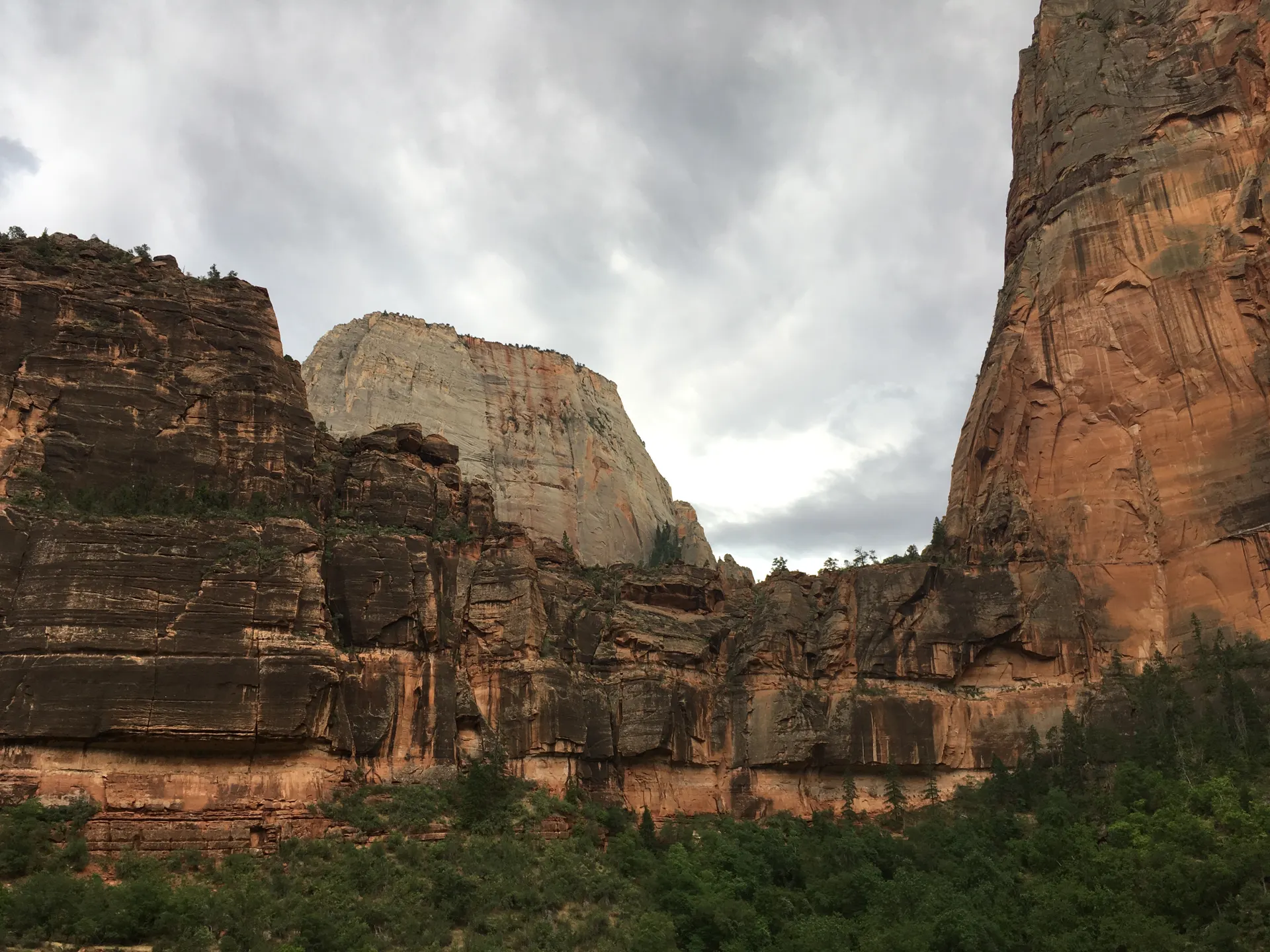 Cliffs of Zion National Park against a cloudy sky. Cliffs of Zion National Park against a cloudy sky.