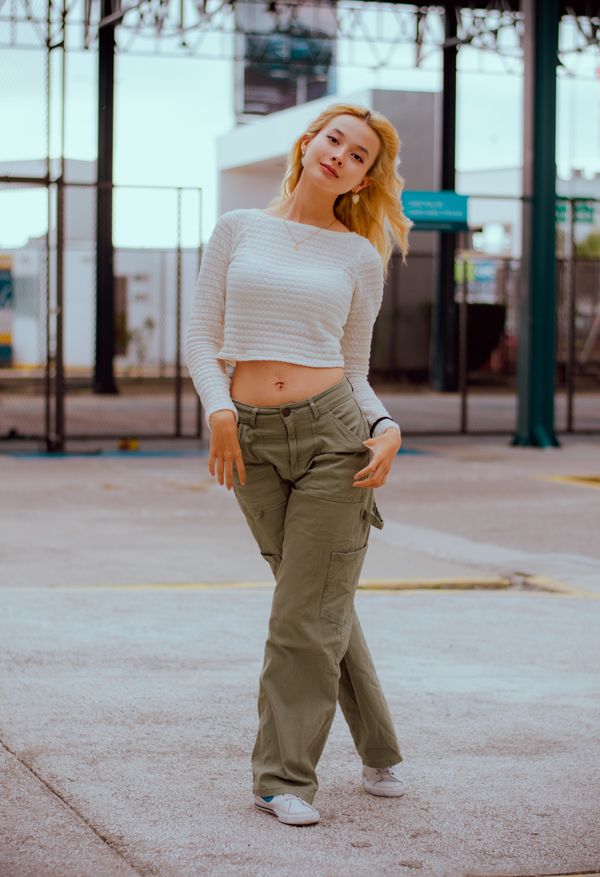 Green cargo pants date night outfit with silk blouse