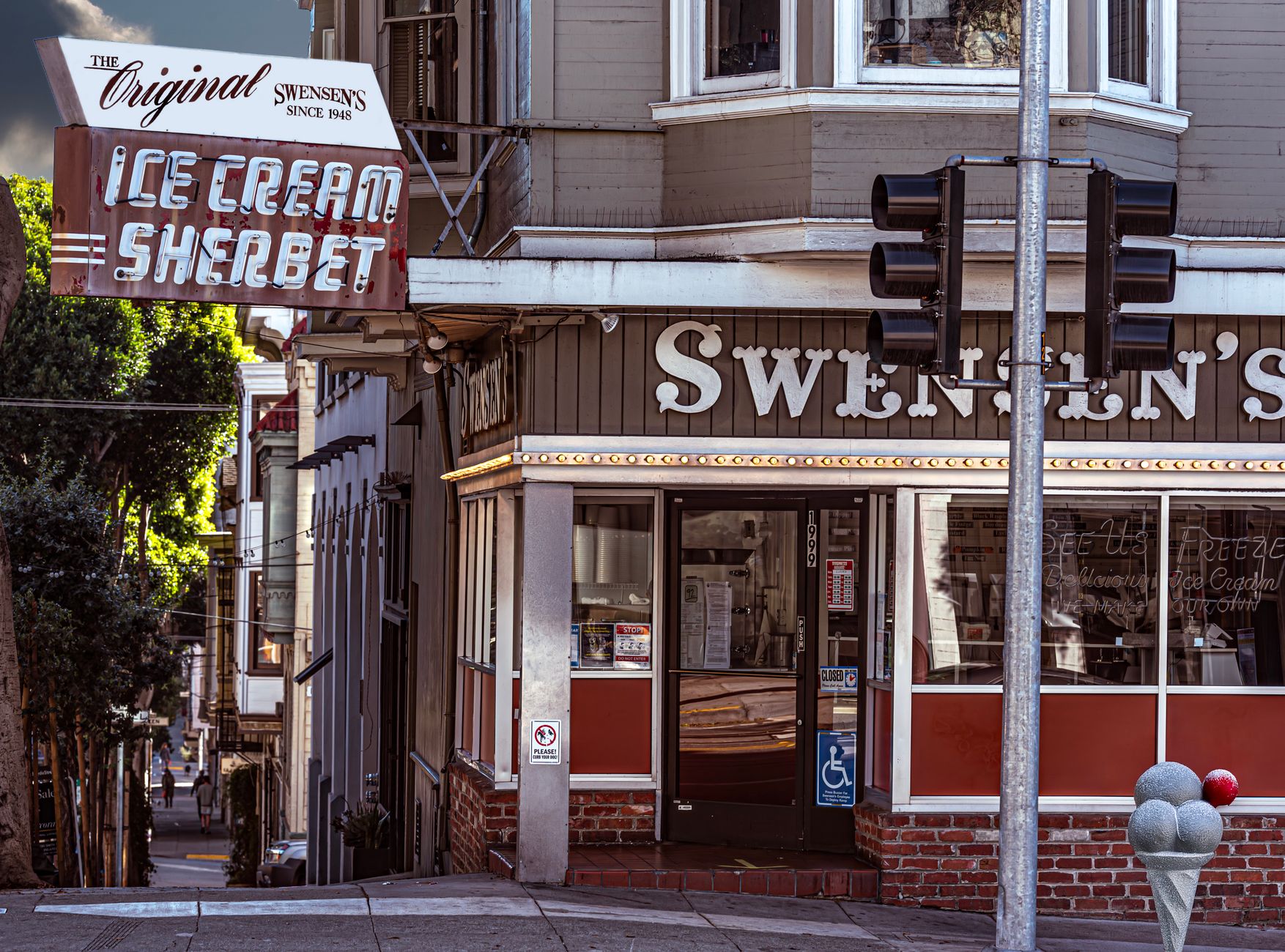 Close-up of hand-scooped ice cream cones with chocolate and vanilla flavors