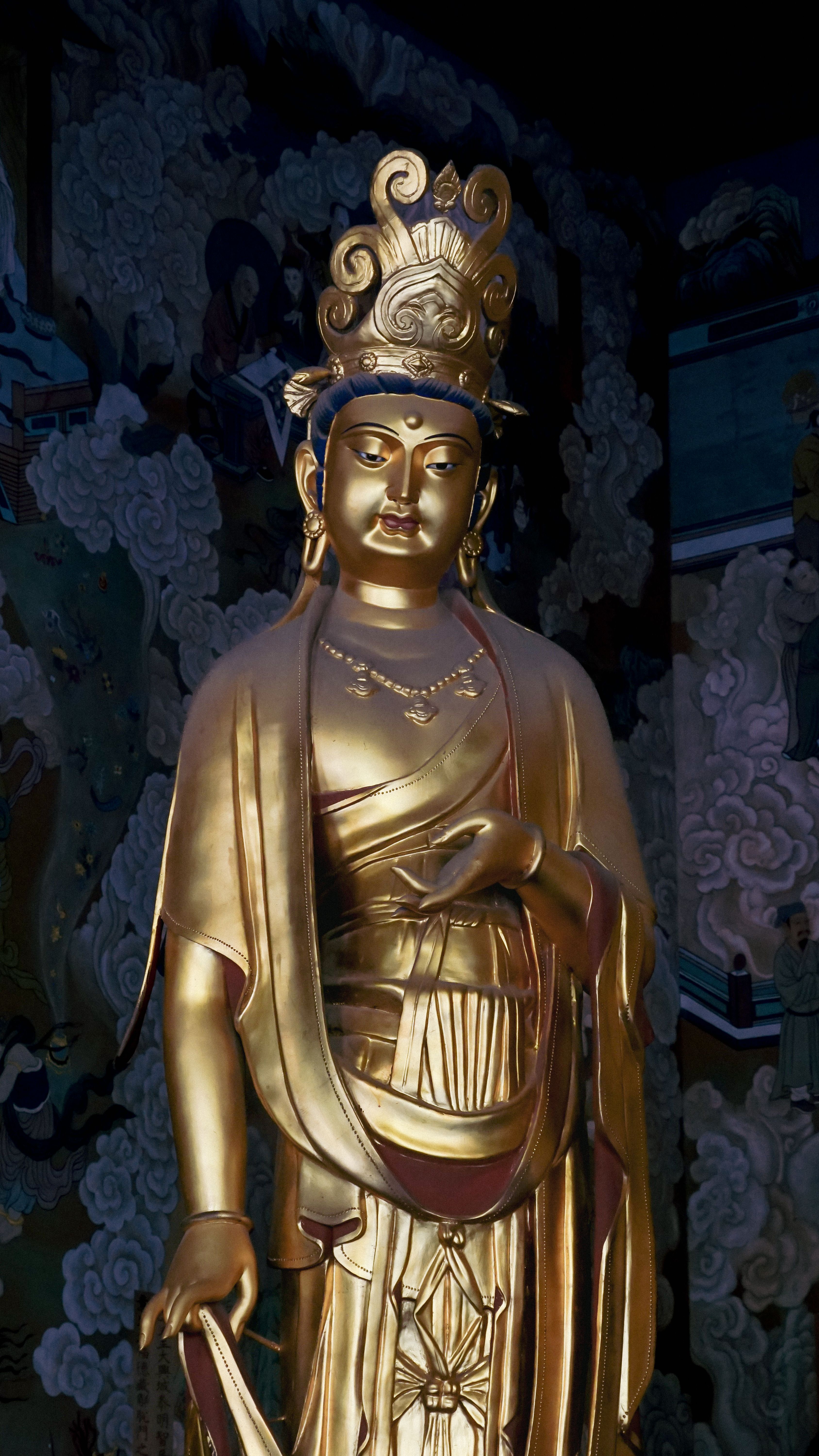 A majestic gold Buddha statue in Datong's historic setting, Shanxi Province, China.