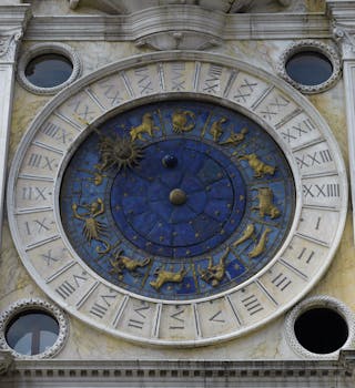 Photo by Goszton Detailed view of the Zodiac Clock at St Mark's Clocktower in Venice, showcasing astrological signs.