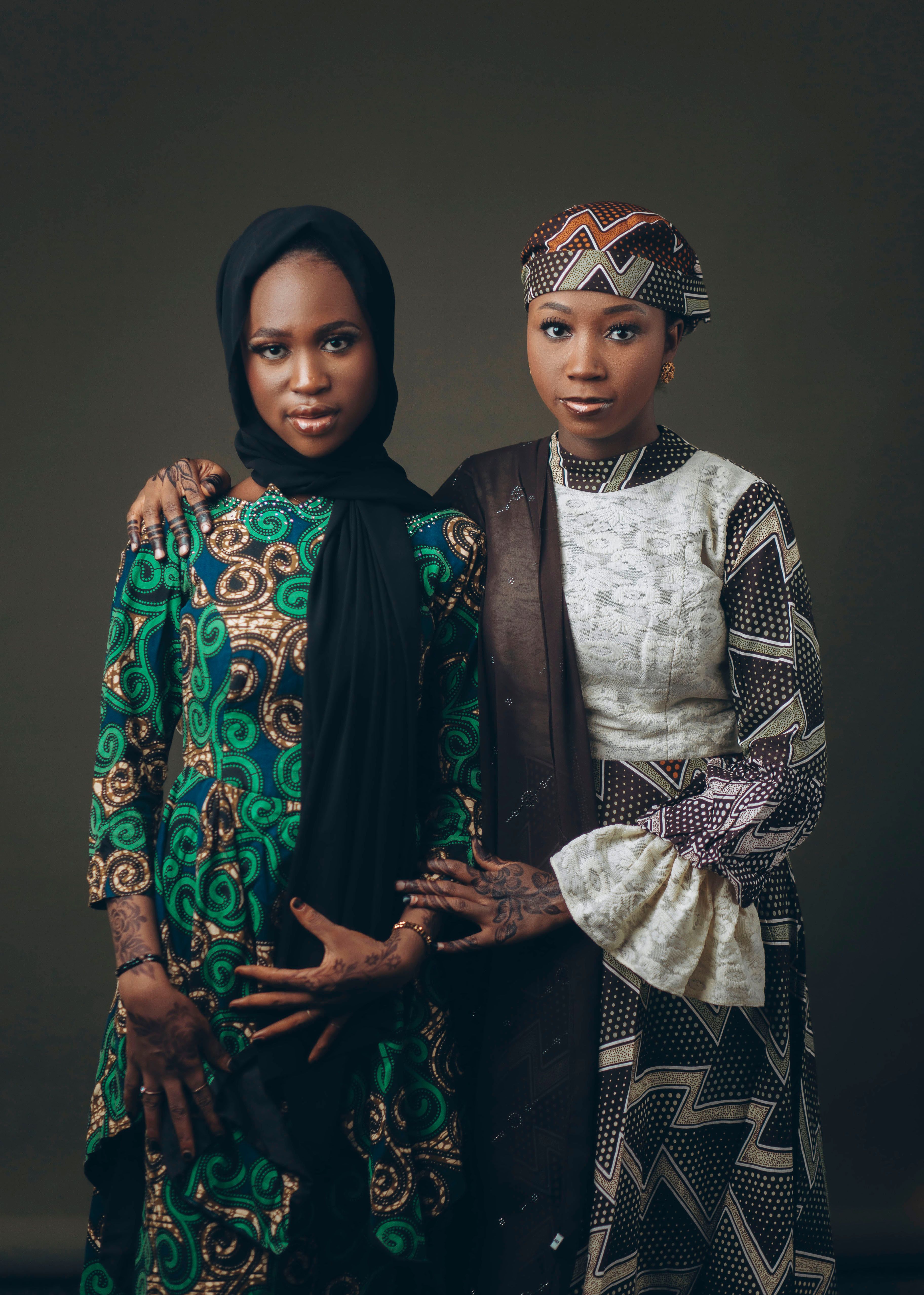 Portrait of Two Women in Traditional Attire · Free Stock Photo