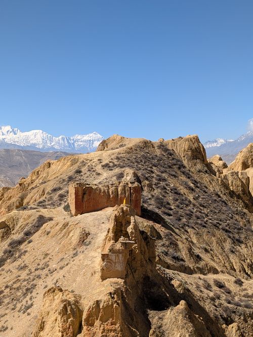 Free Explore the rugged Mustang region with striking cliffs and Himalayan backdrop. Stock Photo